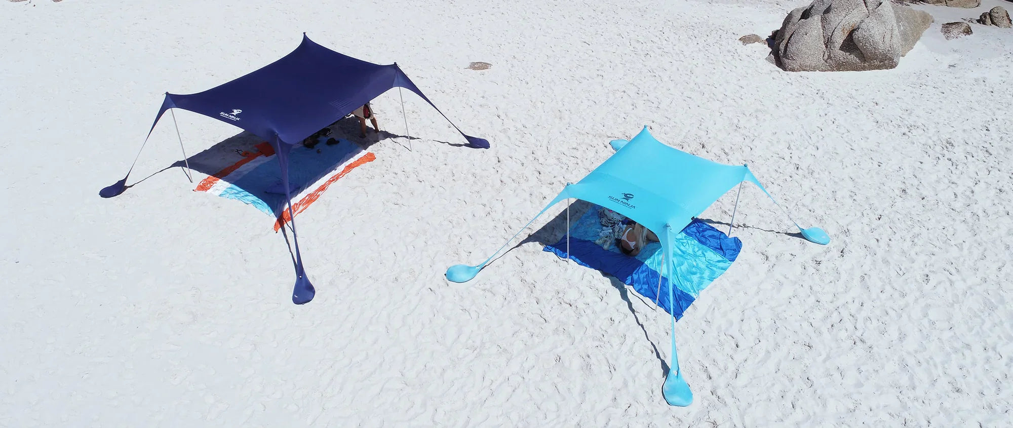 Which is better, a beach umbrella or a tent?